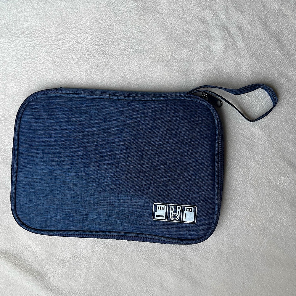 Cord holder for travel or organizing. Holds multiple chargers. NWOT.